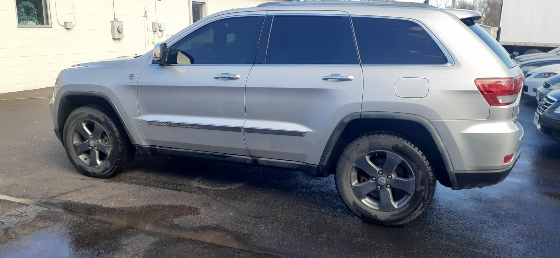 2011 Jeep Grand Cherokee (1J4RR6GT0BC) with an 5.7 Hemi engine, 5-Speed Automatic transmission, located at 2015 Cambell Street, Rapid City, SD, 57701, (605) 342-8326, 44.066433, -103.191772 - CARFAX AVAILABLE - Photo#0